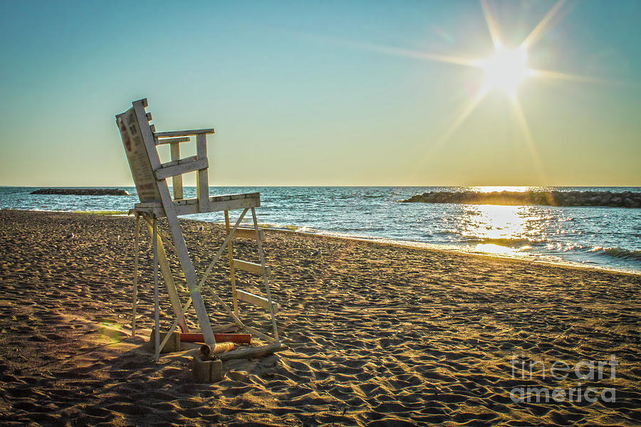 Empty Beach and Lifeguard Chair Photograph by Susan Vineyard