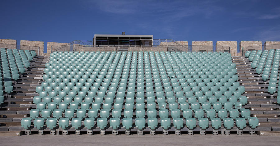 Empty chairs in outdoor amphitheater Photograph by Studio 642