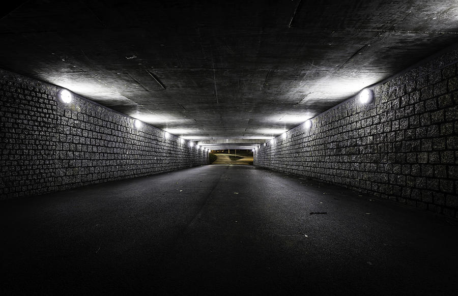 Empty dark tunnel at night Photograph by Marchello74
