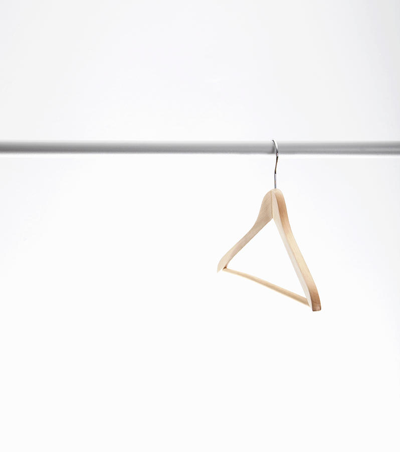 Empty hanger hanging on clothes rack Photograph by Steven Errico