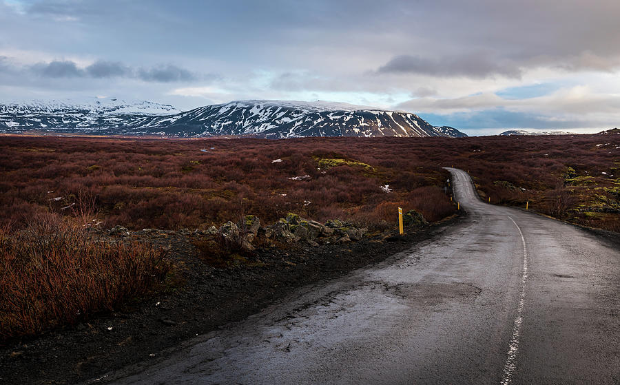 Empty highway countryside road in spring in Iceland Photograph by Michalakis Ppalis