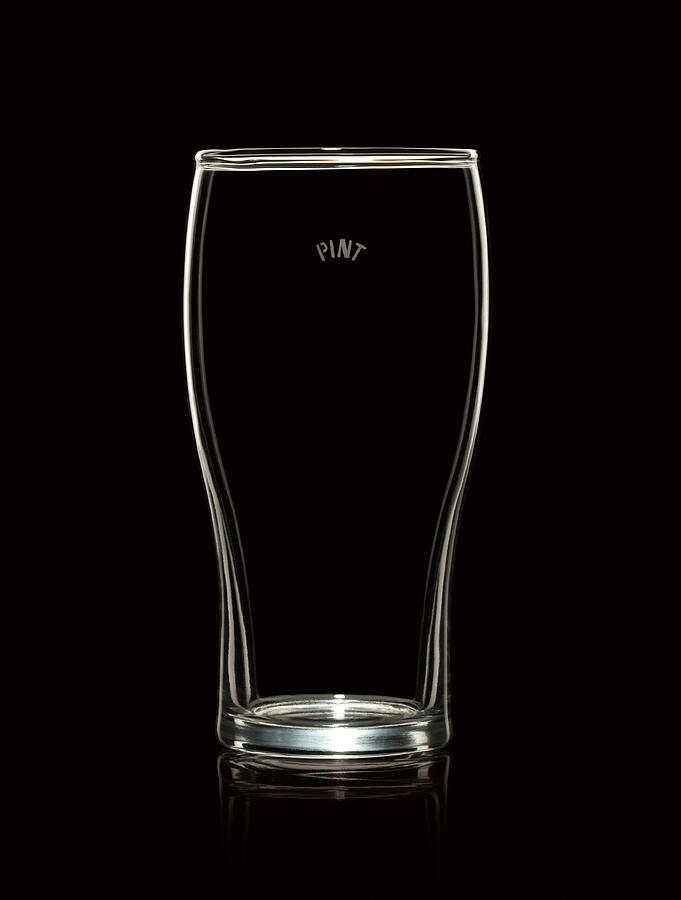 Empty Pint Beer Glass Isolated on Black Background Photograph by Ryasick