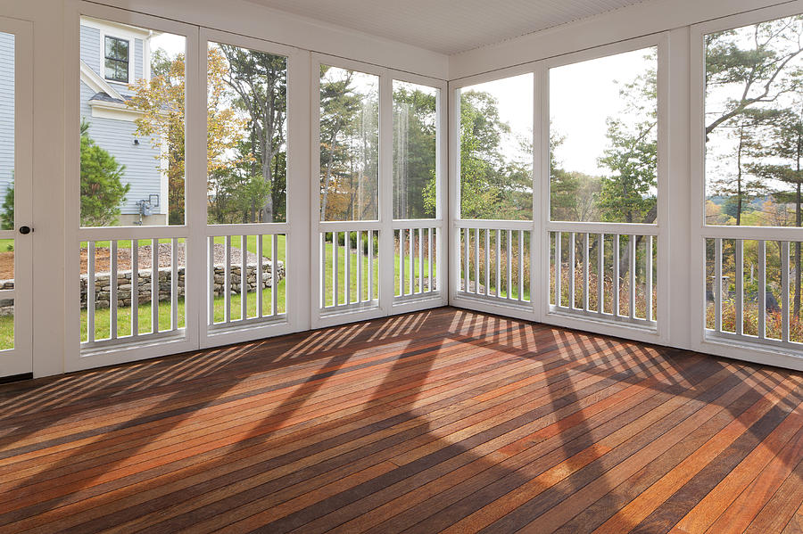 Enclosed outdoor residential deck with hardwood. Photograph by David Papazian