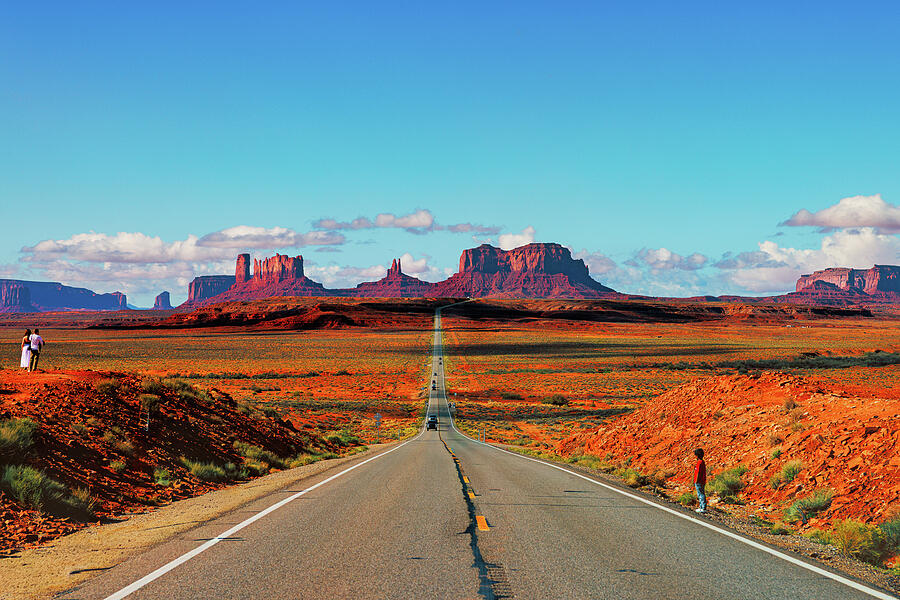 Scenic Road Leading to Monument Valley Photograph - Endless Road to Monument Valley aka Run Forest Run Hill by Robert Niemeier