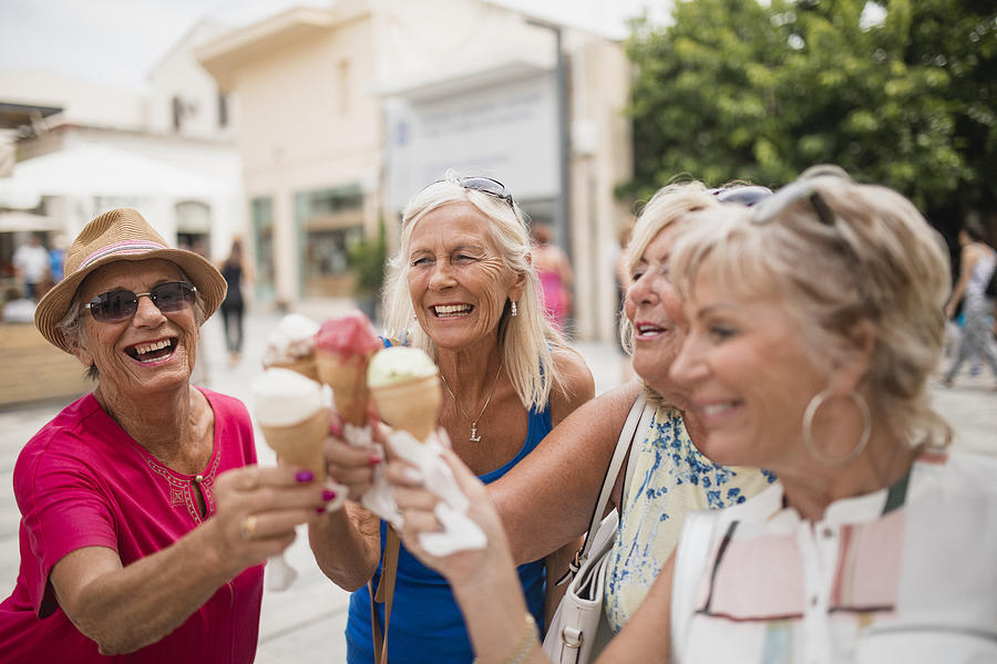 Enjoying Ice Cream Cones in Cyprus Photograph by SolStock