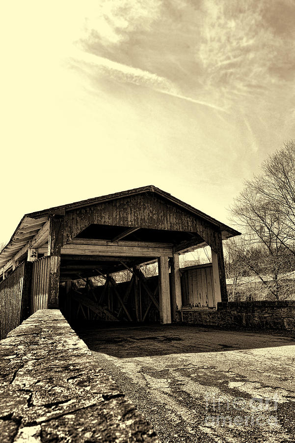 Enter the Covered Bridge sepia Photograph by Paul Ward