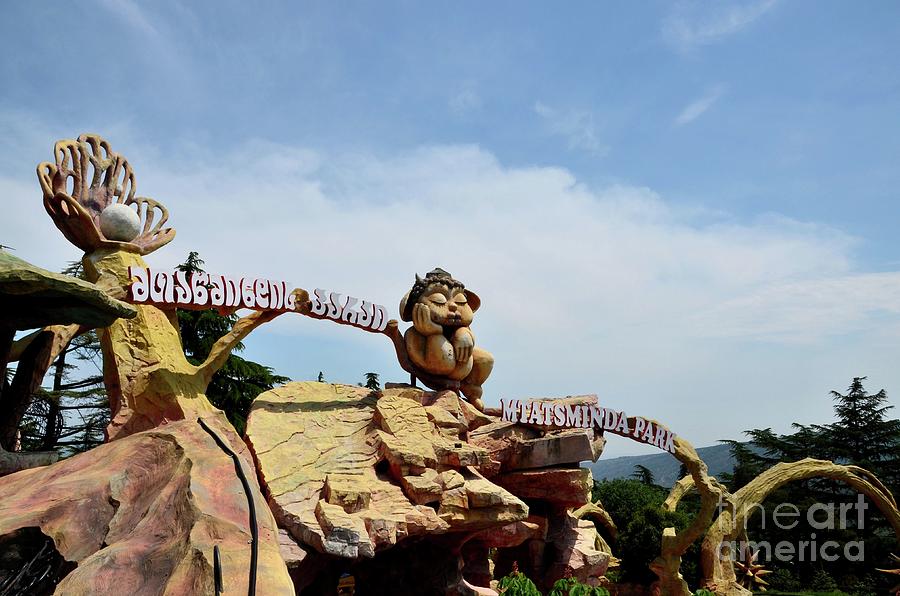 Entrance with mascot character Mount Mtatsminda theme park entrance hilltop Tbilisi Georgia Photograph by Imran Ahmed