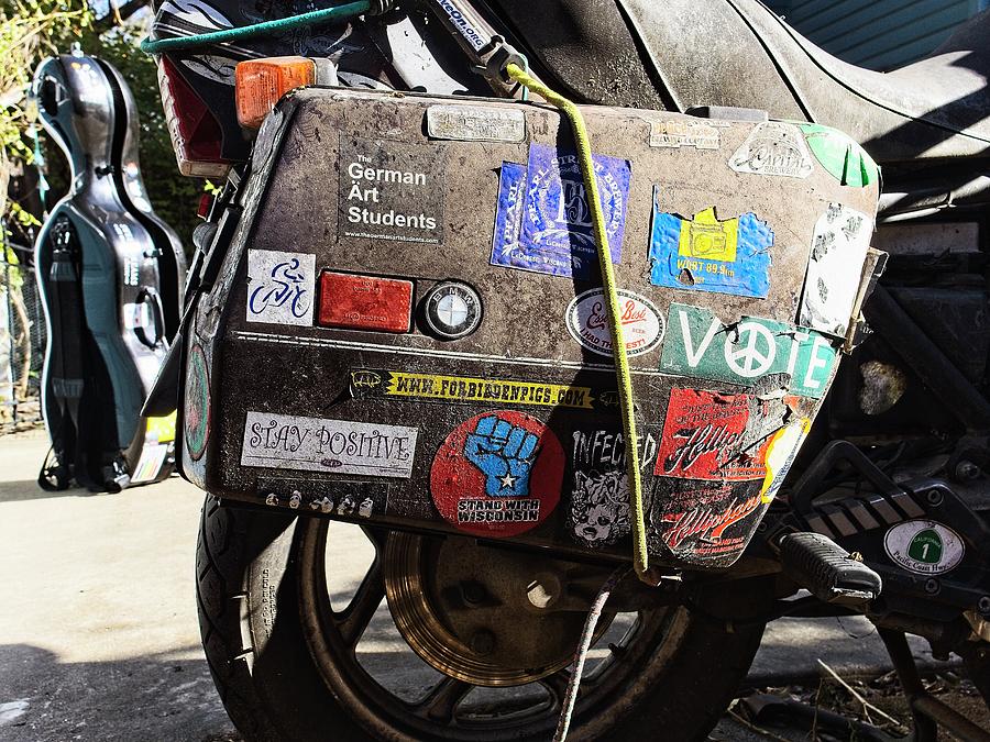 Motorbike sidebag with stickers right Photograph by Steven Ralser