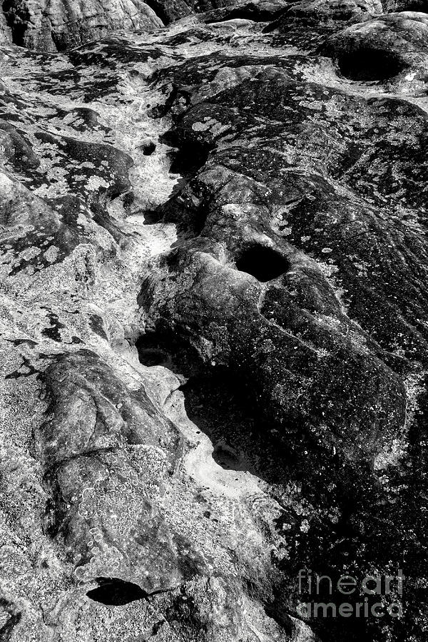 Black And White Photograph - Eroded Rock Surface by Phil Perkins