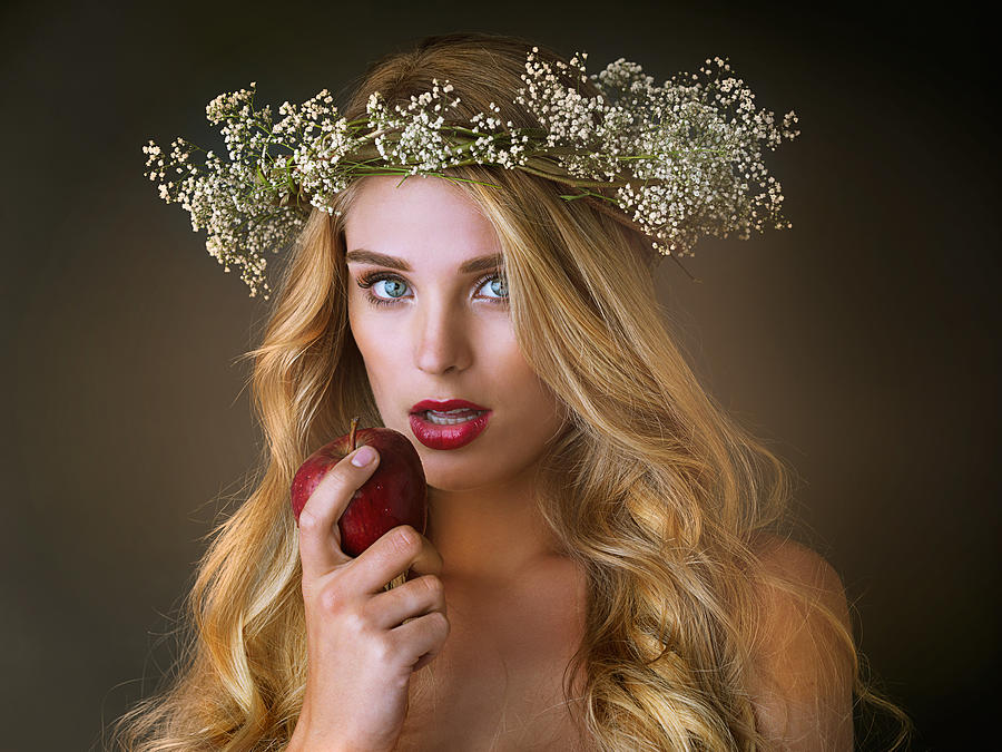 Eve and that fateful apple Photograph by PeopleImages