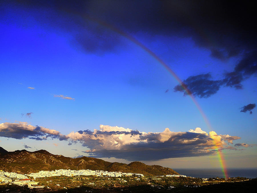 Evening rainbow over Frigiliana and Nerja, Malaga Province, Andalucia, Spain Photograph by Panoramic Images