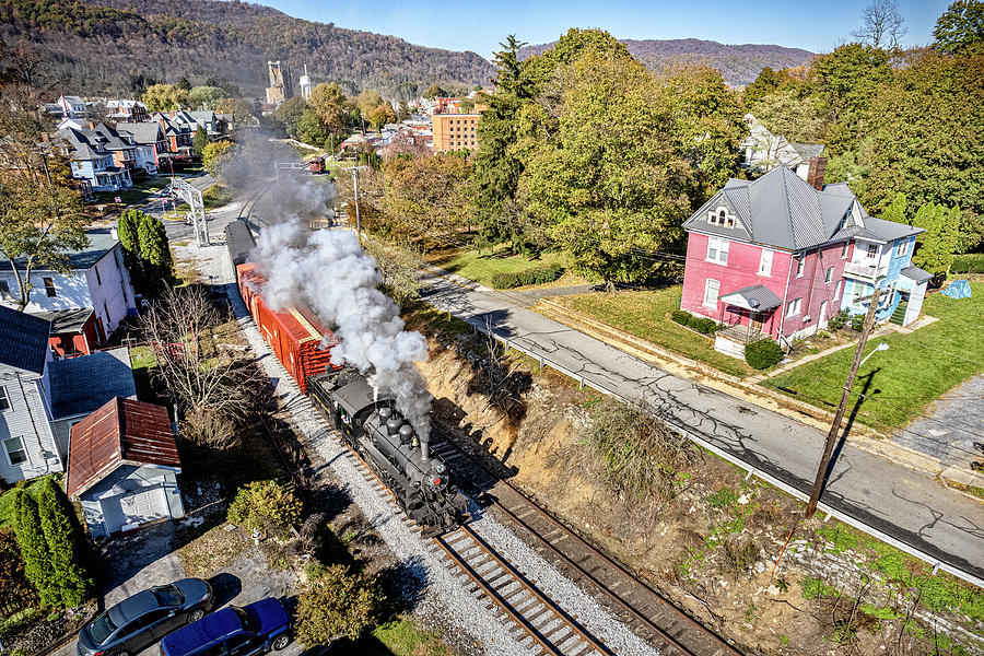 Everett Railroad #11 pulls out of downtown Roaring Spring Pennsylvania Photograph by Jim Pearson