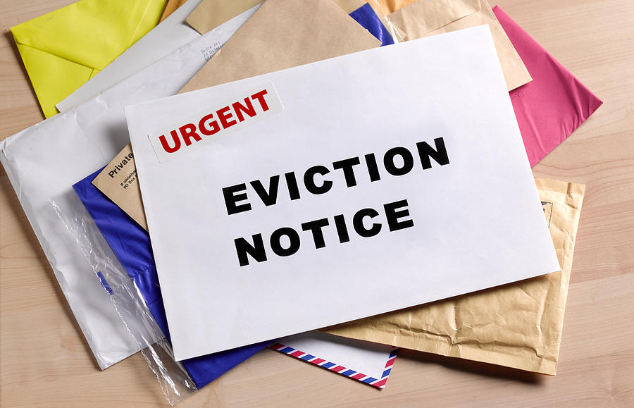 Eviction notice on door step Photograph by Peter Dazeley
