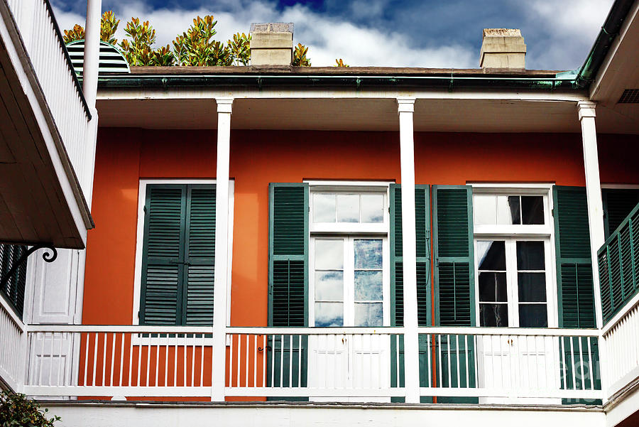 Architecture Photograph - New Orleans Creole Courtyard Balcony by John Rizzuto
