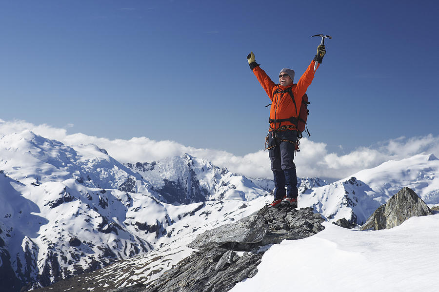 Excited Mountaineer Standing on Apex Photograph by Moodboard