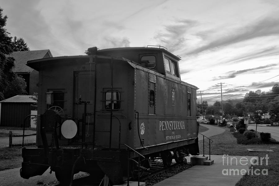 Export PA Railroad Caboose Under Fiery Streaks Black And White Photograph by Adam Jewell