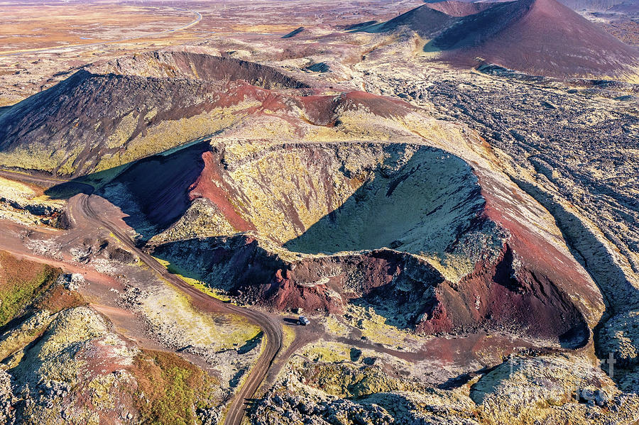 Extinct volcano crater and the lava fields of the Berserkjahraun Photograph by Jane Rix