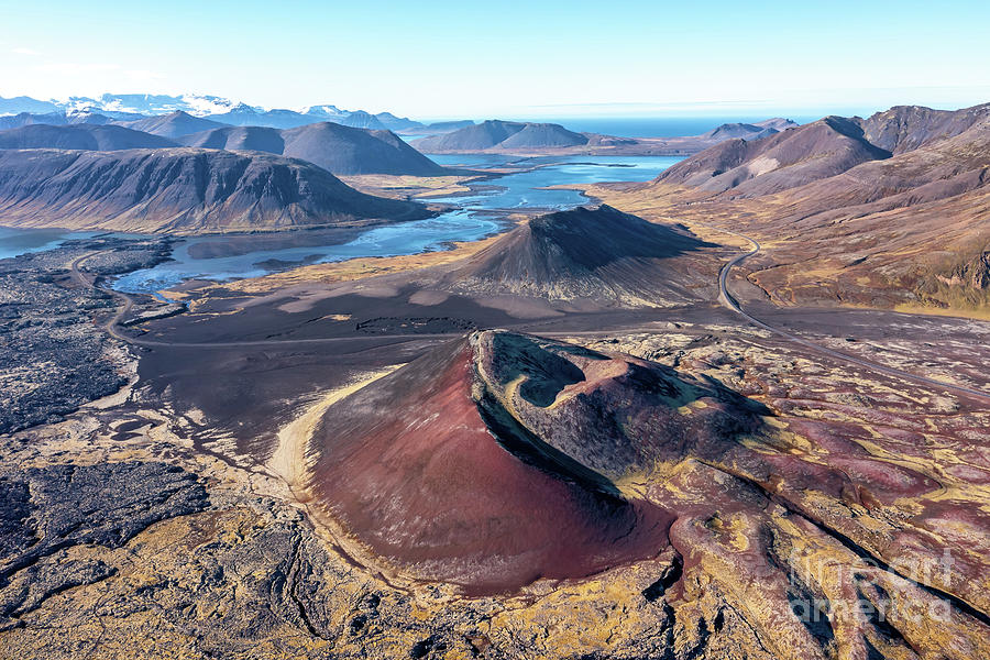 Extinct volcano, lava fields, lakes and mountains, with the sea  Photograph by Jane Rix