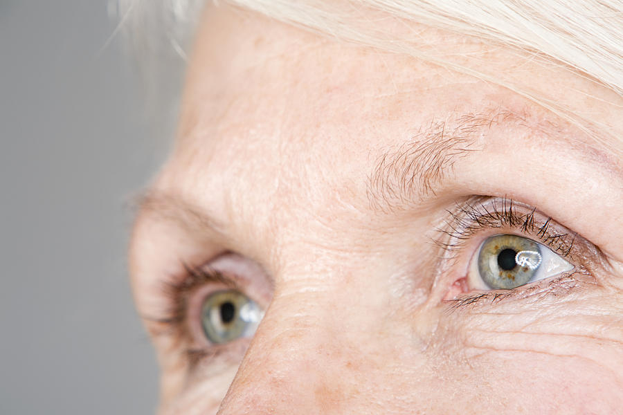 Eyes of a senior woman Photograph by Image Source