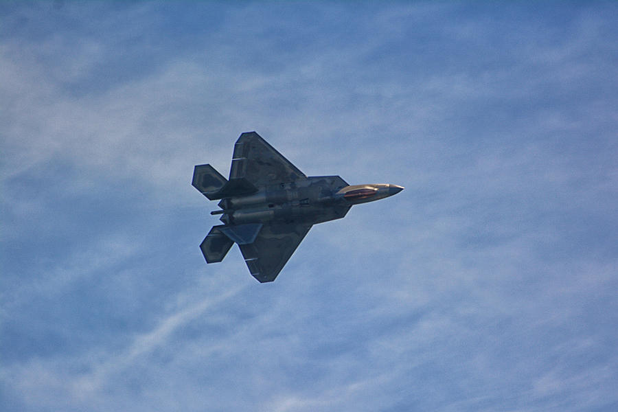 F-22 Banks a Turn Photograph by Raymond Salani III