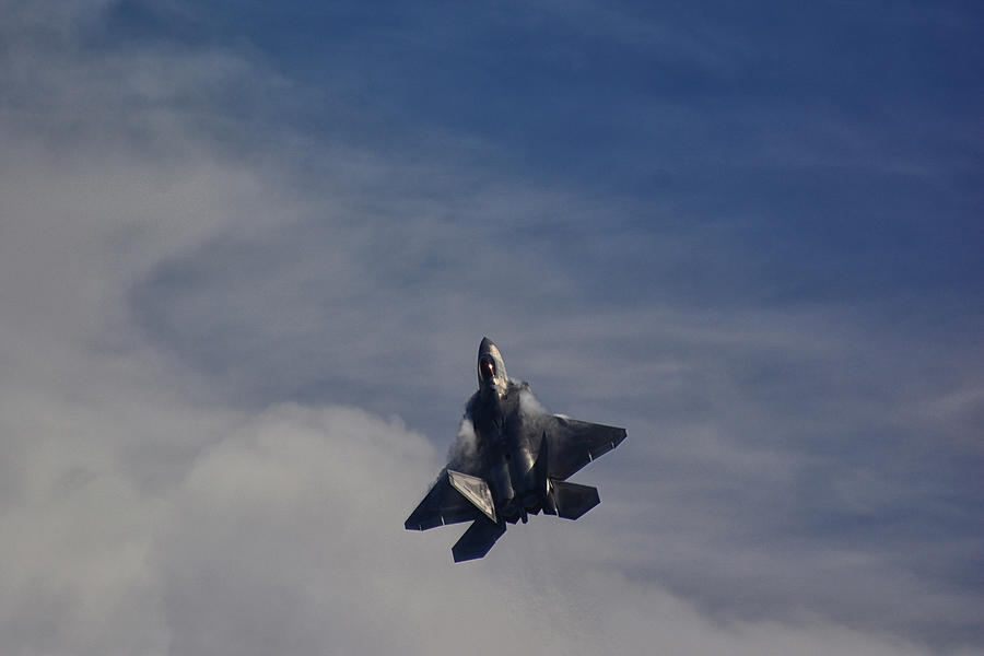 F-22 Raptor and Cloud Bank Photograph by Raymond Salani III
