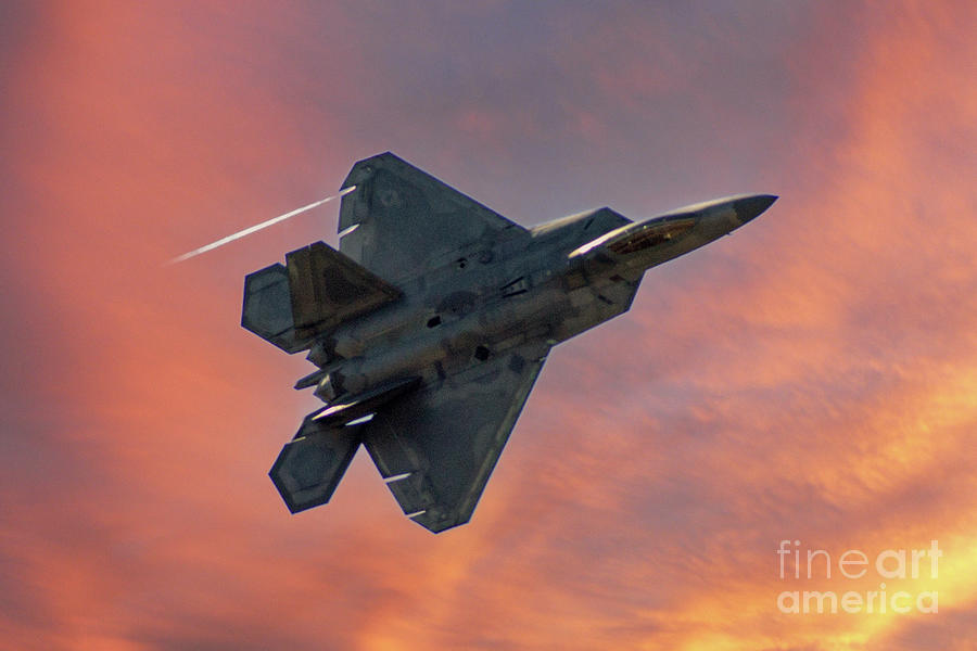 F-22 Raptor in Flight Photograph by Kevin Fortier