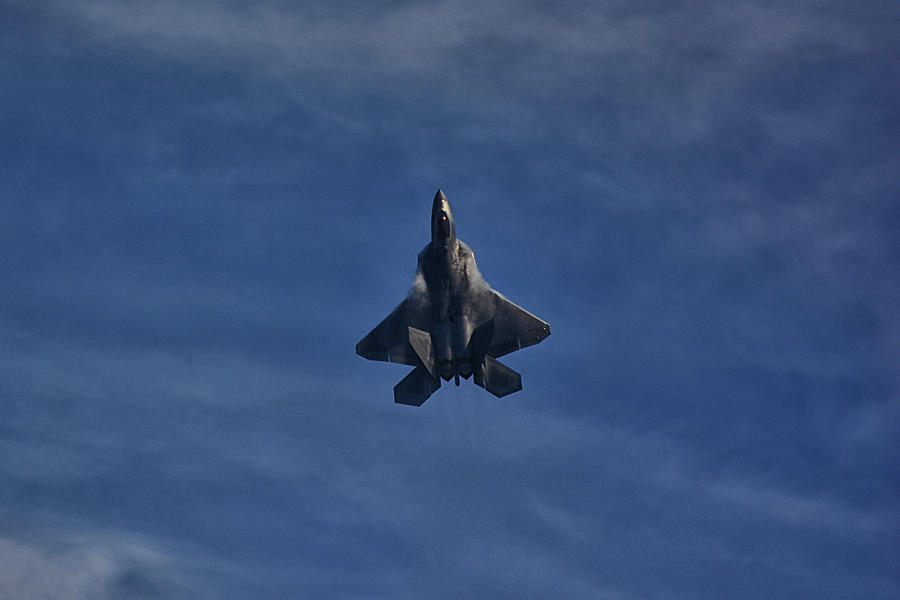 F-22 Shoots Through Blue Sky Photograph by Raymond Salani III