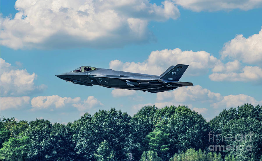 F-35A Lightning II Touch and Go Photograph by Kevin Fortier