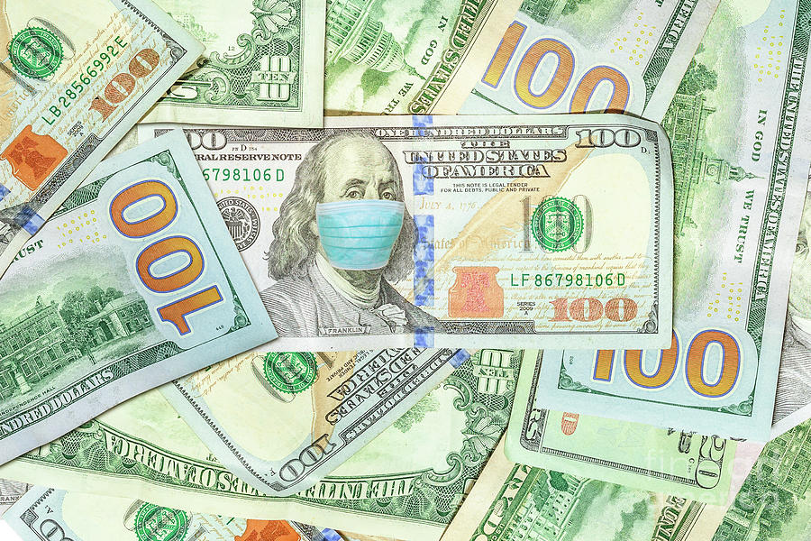 Face mask on American dollar banknote Photograph by Benny Marty