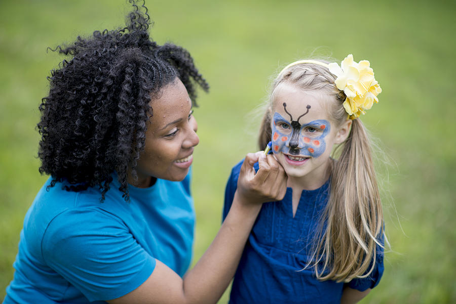 Face Painting at the Park Photograph by FatCamera