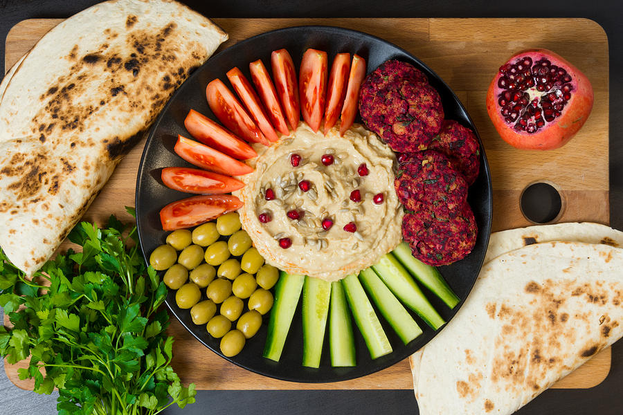 Falafel, pita, hummus and vegetables Photograph by By Ale_flamy