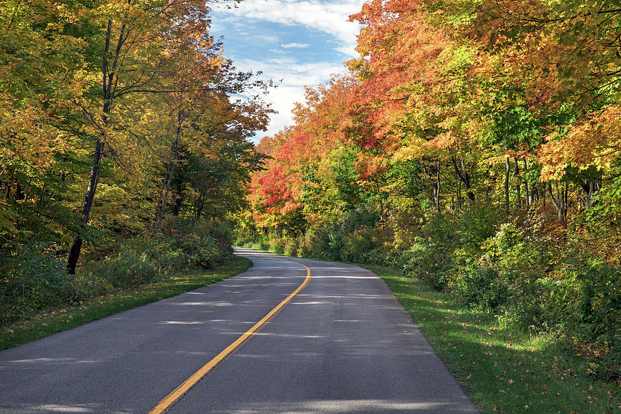 Fall along the Lac Fortune Parkway Photograph by Michael Russell