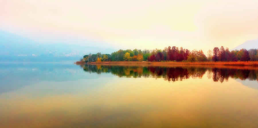 Fall colors at Annones Lake Photograph by Roberto Pagani