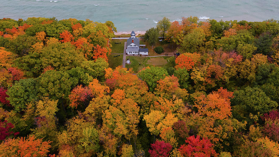 Fall colors at Mission Point Lighthouse in Traverse City Michigan Photograph by Eldon McGraw