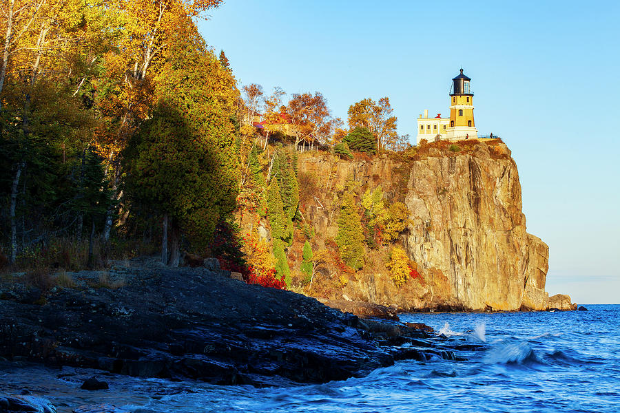 Fall colors on Split Rock lighthouse on Lake Superior Photograph by ...