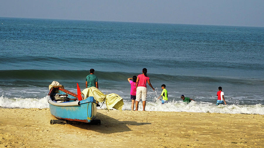Families enjoy the time on the beach in India by Santosh Puthran Families enjoy the time on the beach in India by Santosh Puthran