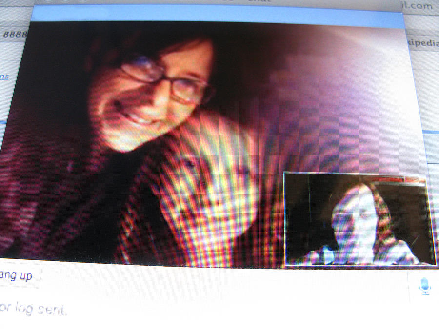 Family has a Web Chat Photograph by Thatcher Keats