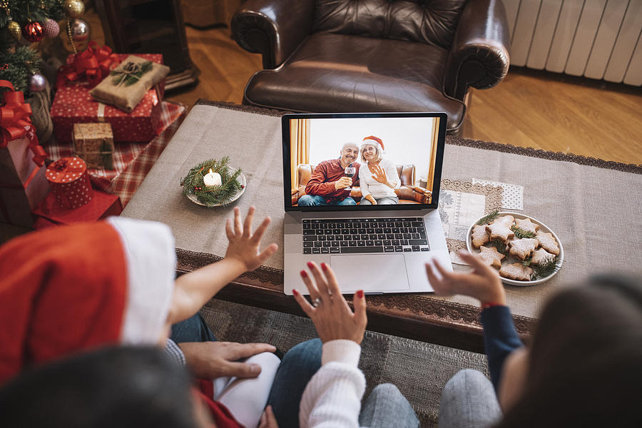 Family in Christmas video call. Photograph by ArtistGNDphotography