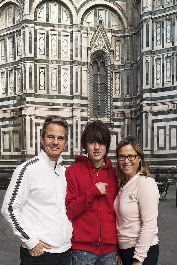 Family of three visiting Florence, Italy. Photograph by Martinedoucet
