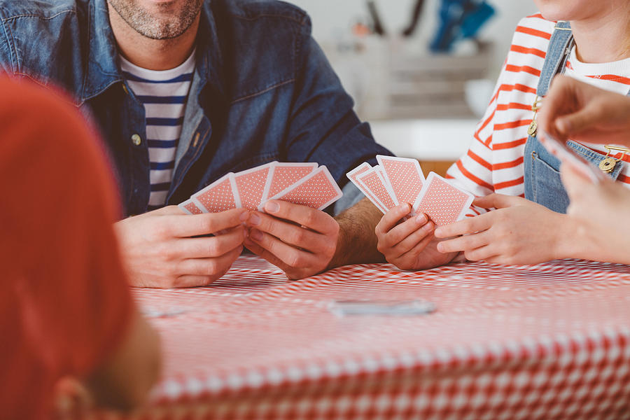 Family playing cards Photograph by Izusek