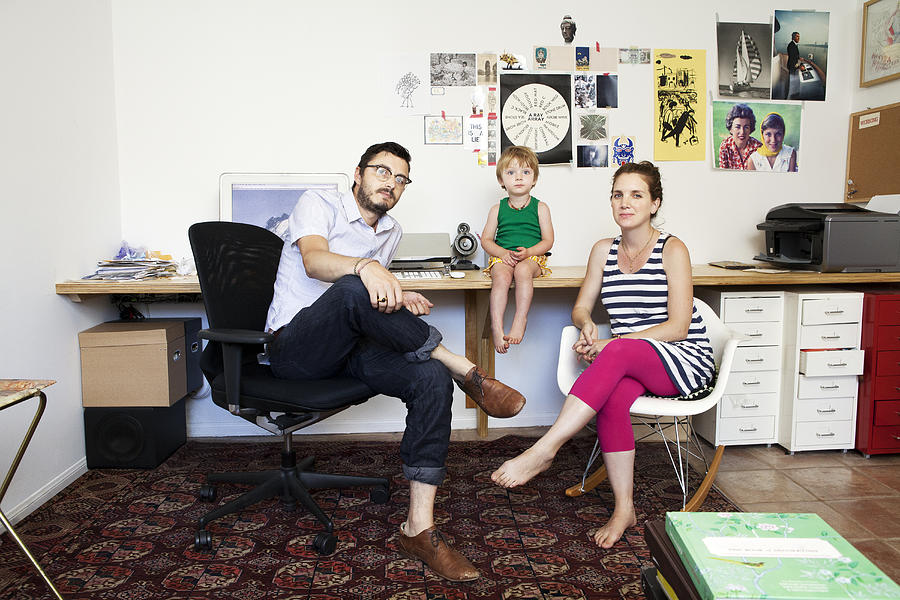 Family Portrait in hip home office Photograph by Catherine Ledner