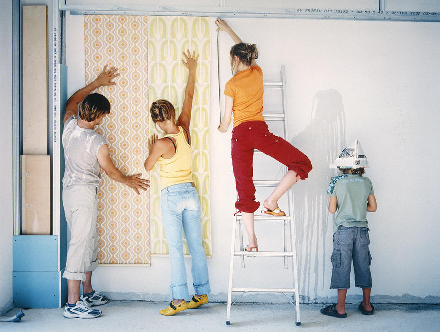 Family Renovating Home Photograph by Anna Peisl