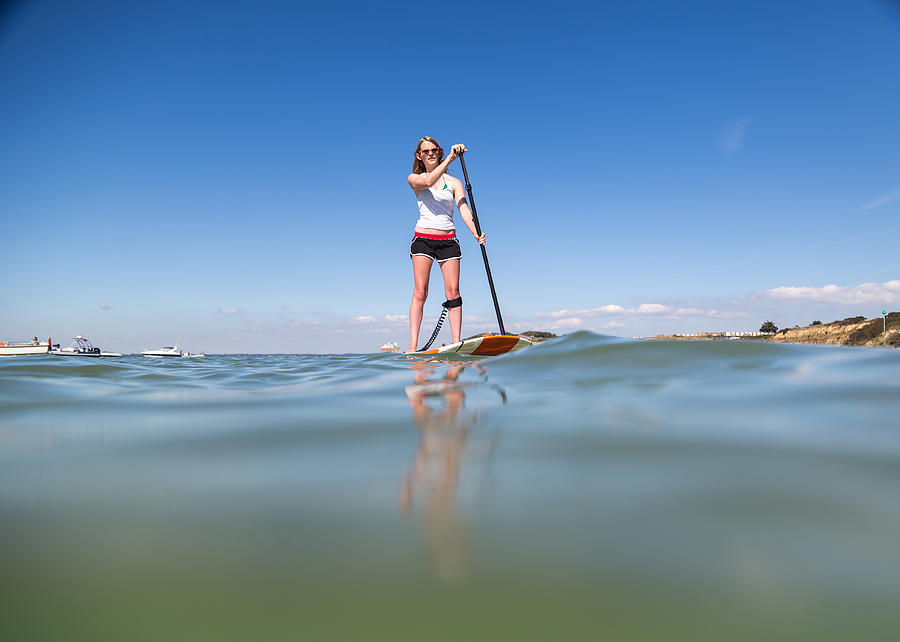 Family Stand Up Paddleboarding on the Isle of Wight. Photograph by s0ulsurfing - Jason Swain