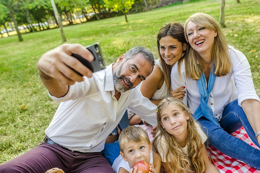 Family time wouldnt be complete without a selfie Photograph by Ljubaphoto