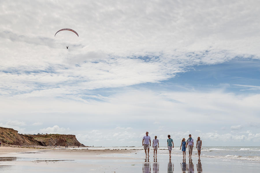Family walk along the beach Photograph by s0ulsurfing - Jason Swain