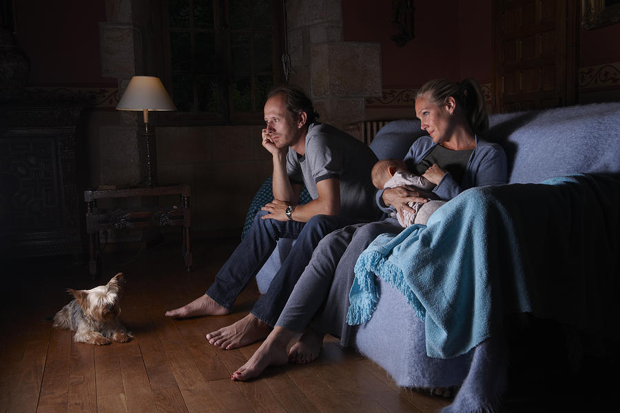 Family watching television together Photograph by Ghislain & Marie David de Lossy