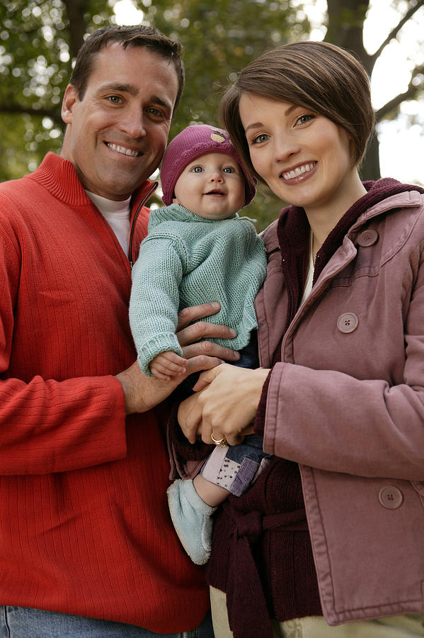 Family with baby Photograph by Comstock Images