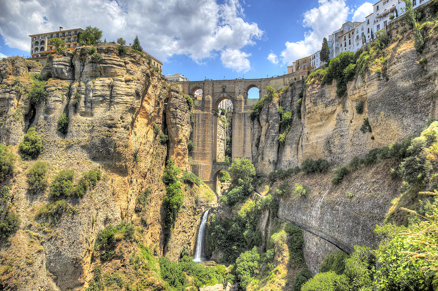 Famous bridge over cavernous cliffs, Ronda Photograph by Luis Davilla