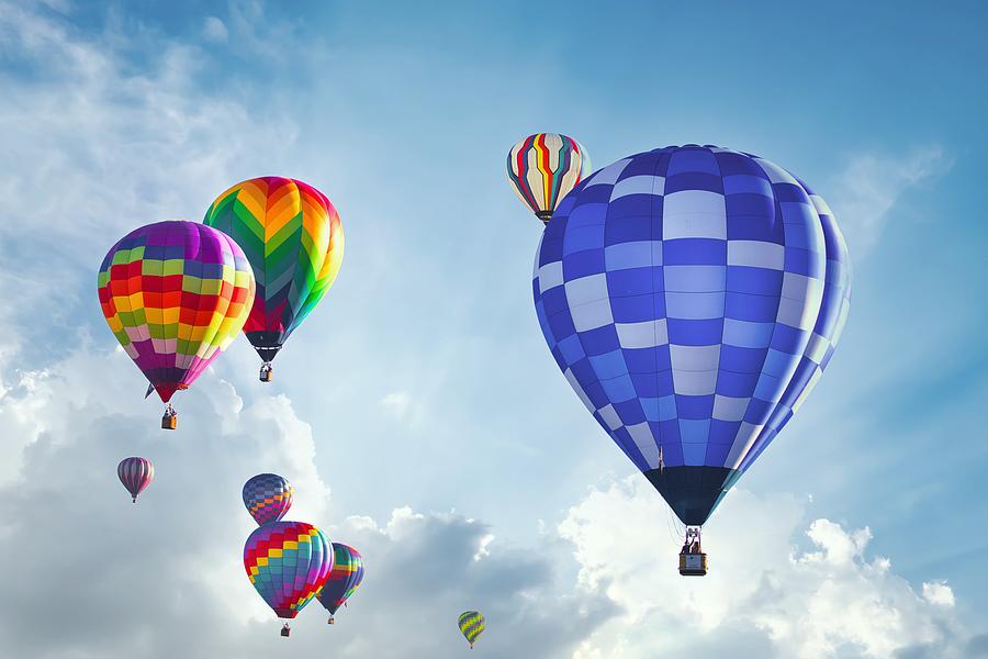 Fantasy Clouds and Hot Air Balloons Photograph by Lynn Hopwood