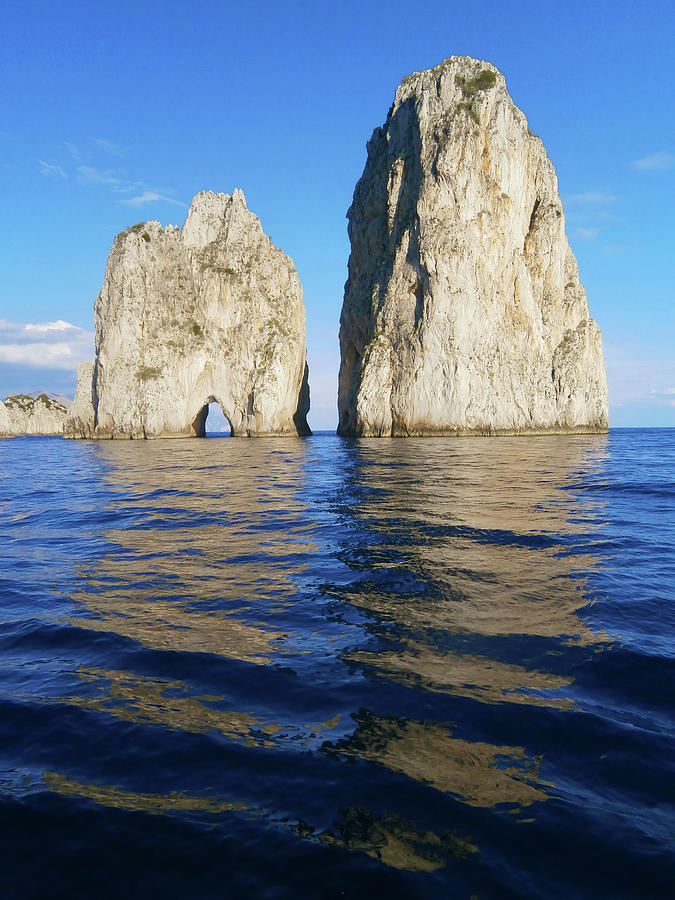 Faraglioni Rocks at Capri Island, Rock Formation with Reflection on the Sea Photograph by Aneta Soukalova